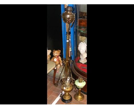 A brass adjustable oil standard lamp - for restoration, together with two oil lamps 