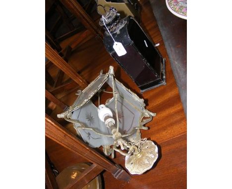 A Bishop &amp; Sons dark room lamp together with a metal ceiling hanging light