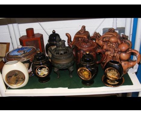 A collection of Oriental ceramics together with a carved wooden octagonal tea caddy