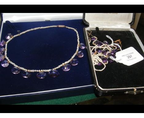 A suite of amethyst jewellery  CONDITION REPORT2 necklaces1 pair of earings 1 ring