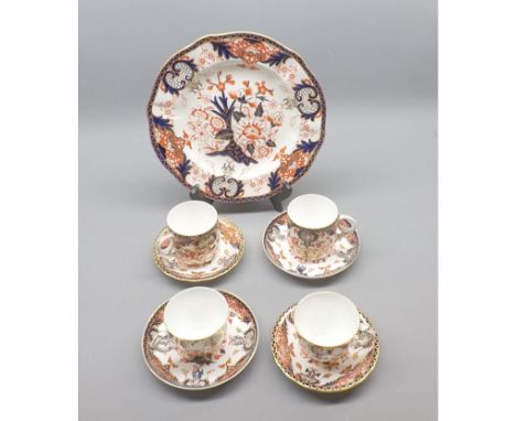 Quantity of Royal Crown Derby table wares, comprising four cups and saucers and a circular plate, decorated in Imari type det