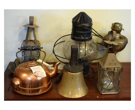 Selection of metal work to include; an alloy bell with leather hanging strap, brass swivel arm, hook and oak backing, three a