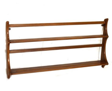 Set of Ercol open wall shelves having two shelves with back rails between shaped sides, label verso   Condition: 