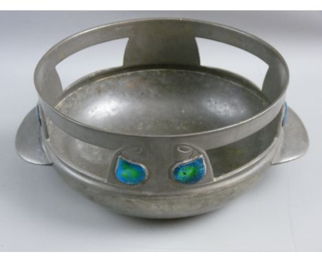 AN ARCHIBALD KNOX DESIGNED ENGLISH PEWTER BOWL, no. 0320, twin handled, 19.75 cms diameter, the sides with near rectangular a