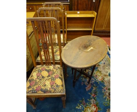 A VINTAGE OAK BOOKCASE, three high backed side chairs and a folding mahogany table, various measurements
