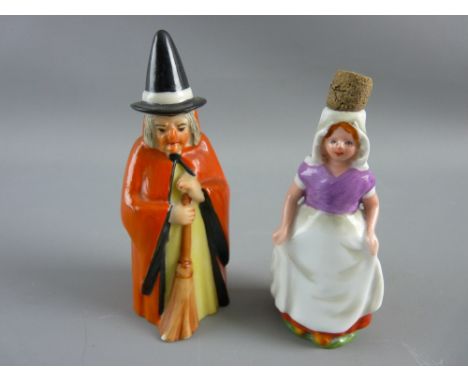 A ROYAL WORCESTER SNUFFER and a Dutch girl bottle with cork stopper, the snuffer in the form of a witch with red cloak and bl