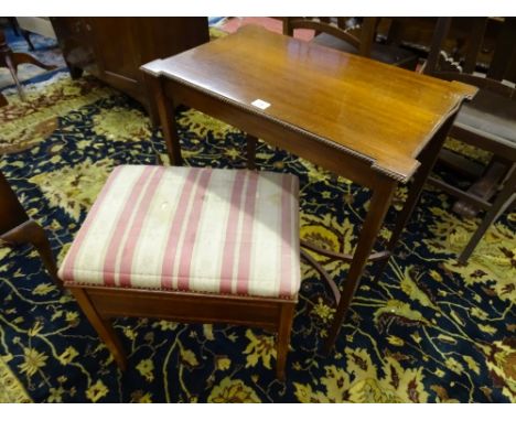 AN EDWARDIAN SIDE TABLE & an inlaid mahogany rise and fall stool, the rectangular topped table with 'X' frame stretcher on ta