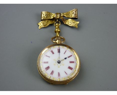 A FIFTEEN CARAT GOLD CASED LADY'S FOB WATCH with ribbon bow pin, gilt highlighted white enamel dial, set with red Roman numer