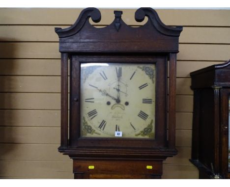 A CIRCA 1830 OAK LONGCASE CLOCK by W J Davies, Harlech, the signed 14 ins square dial set with Roman numerals, subsidiary sec