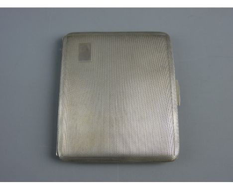 A SILVER CIGARETTE CASE, Birmingham 1944, 4.9 troy ozs, near mint condition with gilt interior