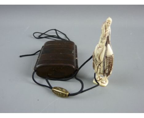A JAPANESE INRO with Ojime and Netsuke, undecorated five section lacquerwork Inro, the Ojime decorated with floral panels, th