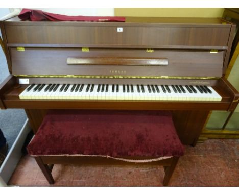 A MODERN MAHOGANY EFFECT YAMAHA UPRIGHT PIANO & DUET STOOL, 108.5 cms high, 148.5 cms wide, 53.5 cms deep
