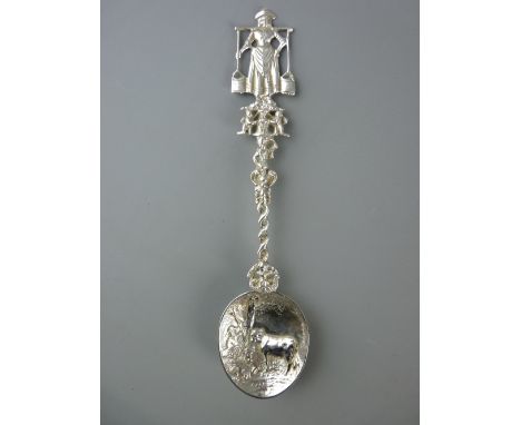 A DUTCH SILVER SPOON, London import mark for 1908, 1.9 troy ozs, typically formed having a milkmaid surmount and a farmer wit