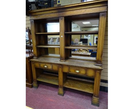 A VINTAGE OAK MIRROR BACK PUB SIDEBOARD, the upper section having a stepped cornice with an open arrangement of six mirrors, 