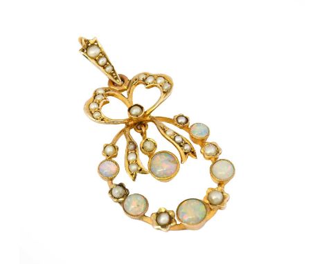 An Edwardian opal and split pearl pendant, the bow motif set throughout with split pearls suspending a circular frame formed 