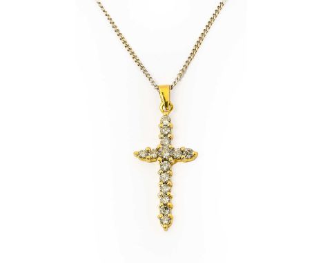 A diamond cross pendant on chain, the cross motif formed of round brilliant cut diamonds in white claw settings, suspended fr