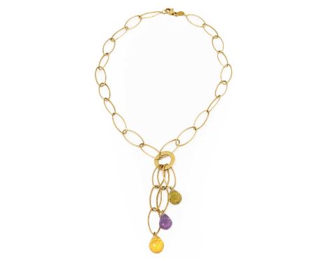 An amethyst and citrine fancy link necklace, the yellow oval trace links centred by a disc which suspends two citrine briolet