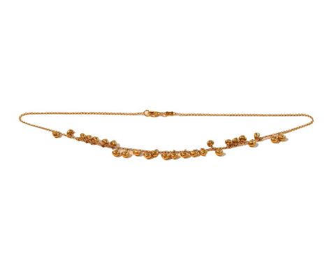 A 9 carat gold necklace, the yellow trace link chain with a central section formed of plain polished heart shaped drops, leng
