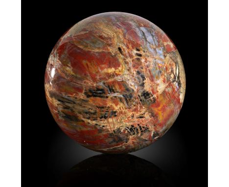 Minerals: A fossil wood sphere  Arizona, Triassic 18cm diameter