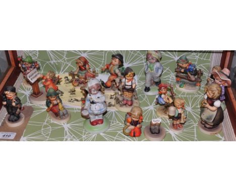 A collection of 17 Hummel figures