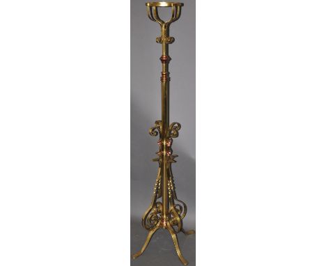 A brass & copper floor lamp, with internal stepped extension mechanism. H 136-186cm
