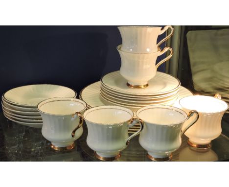 A part tea service "Lustern" pattern to include six cups and saucers, six sandwich plates and six tea plates