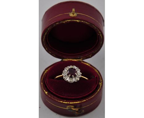 An 18ct (750) gold, ruby and diamond dress ring