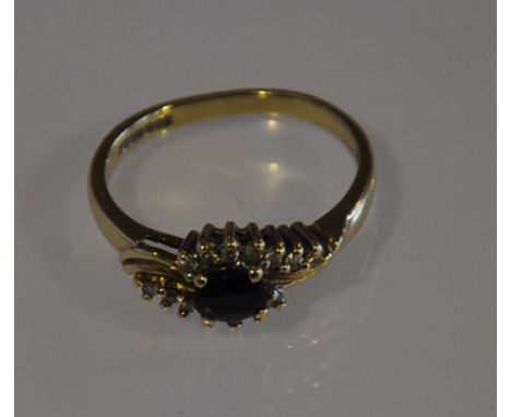 A 9ct gold sapphire and diamond ring