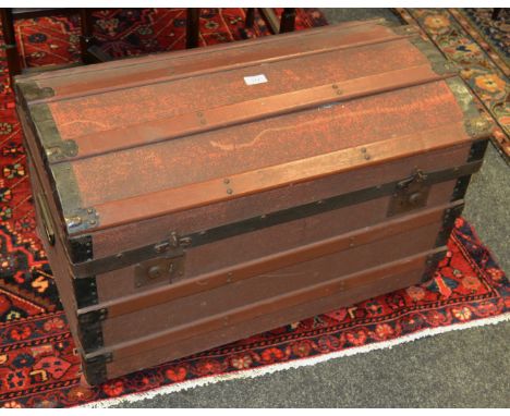 A dome top vintage travel trunk