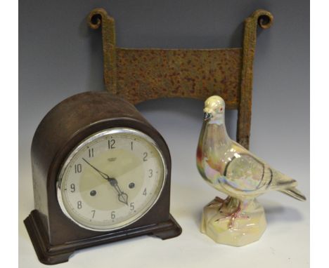 A Jenna Holland model of a Pigeon; an early to mid 20th century Smiths mantel clock; a cast iron boot scraper (3)