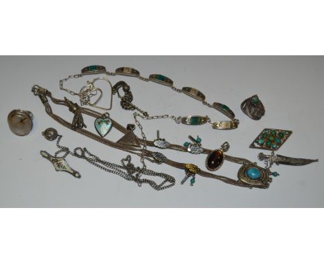An Egyptian silver, turquoise and niello necklace; rings; pendants; enamel; etc
