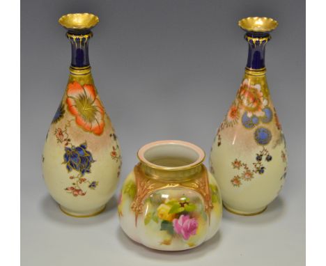 A Royal Worcester lobed ovoid pot pourri vase, painted with cabbage roses, a pair of RCD vases