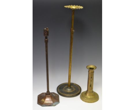 An early 20th century E Pollard and Co Ltd, London hat stand; another similar; an early 19th Century brass ejector candle sti