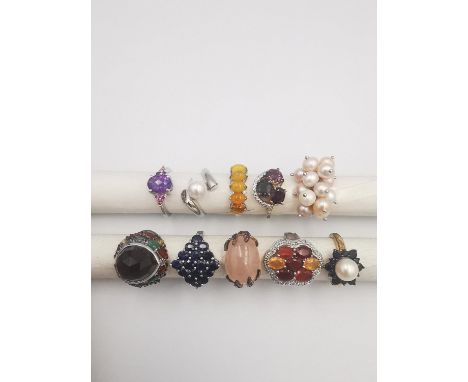 A collection of ten silver and gold plated silver dress rings some set with gemstone and certificates, including opal, Spinel