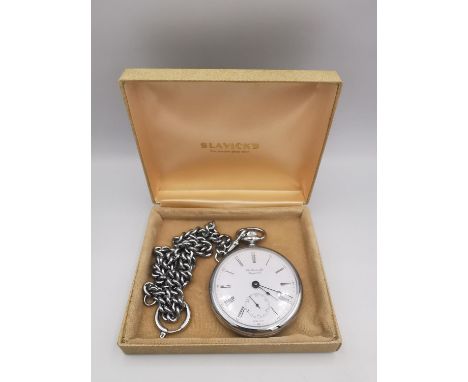 A stainless steel Tissot pocket watch and chain. White enamel dial with smaller seconds dial. 