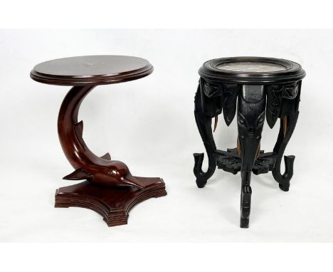 INDIAN LAMP TABLES, two, to include a 19th century ebonised elephant design base with a marble top, 51cm H x 35cm W, together