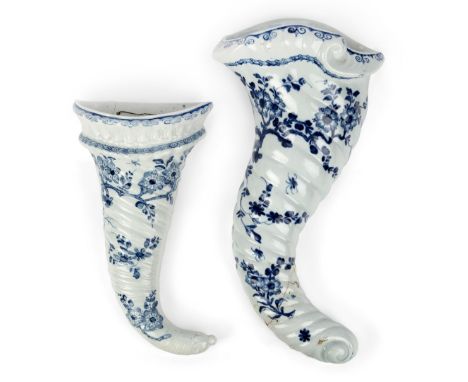 Two Worcester porcelain blue and white wall pockets, c.1755-65, blue crossed swords mark to the larger example, each of spira