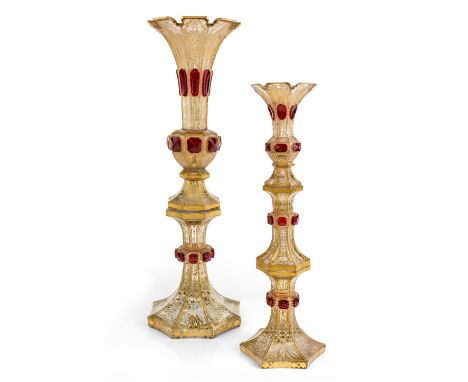 Two Bohemian ruby overlay and clear cut-glass vases, late 19th century, one of octagonal form in two sections, the other hexa