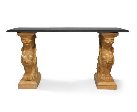 A marble and ceramic console table, late 20th century, the black marble top raised on twin terracotta glazed ceramic bases in