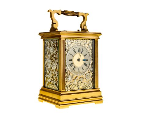 A gilt-brass repeating carriage clock, late 19th century, the case with white metal floral fretwork panels and swing handle, 