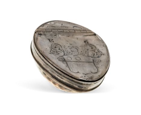 A George III white-metal mounted cowrie shell snuff box, late 19th/early 19th century, the hinged cover with coat-of-arms and