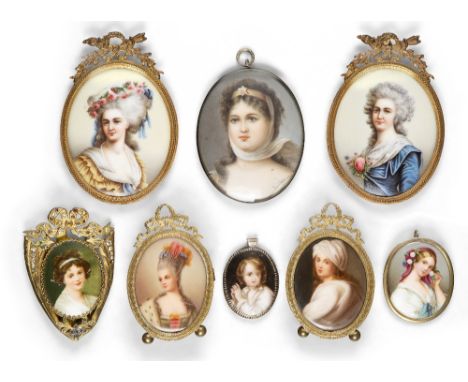 A group of eight Continental porcelain portrait plaques, late 19th/early 20th century, comprising: a pair in gilt-brass frame