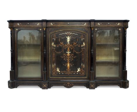 A Victorian ebonised credenza, circa 1860, marquetry and ivory inlaid, the central door with neo classical design depicting f