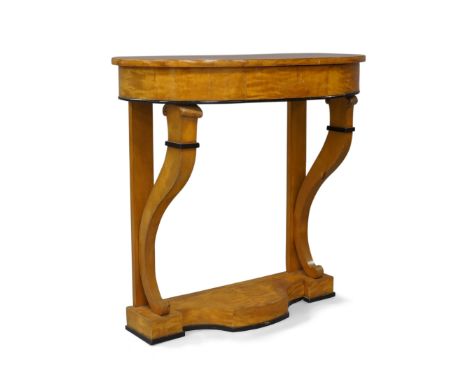 A Biedermeier birch wood console table, 19th century, with ebonised beading, single drawer, raised on curved supports to shap