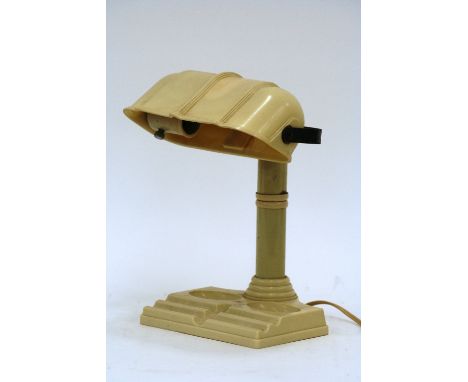 An Art Deco cream Bakelite desk lamp, 28cm