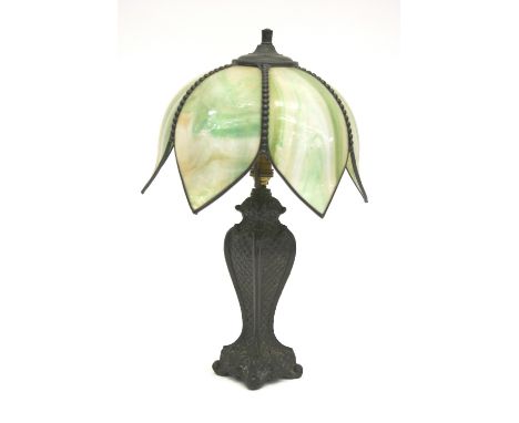 A Tiffany style table lamp, with mottled green glass shade, 48cm high in extremes