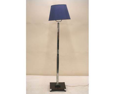 A 1930's chrome standard lamp, raised on stepped wooden base with blue shade, total height 117cm