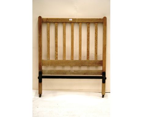 A 1920's/30's Heal & Sons, of London, oak bed-ends, with original label, 92cm wide