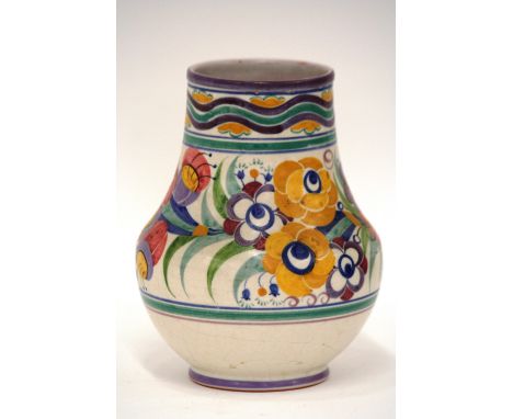 A Carter Stabler & Adams Poole pottery vase, typically decorated with colourful flowers on cream ground, impressed mark to ba