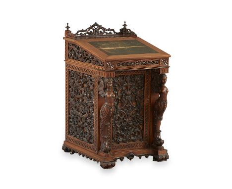 Victorian Davenport desk, likely mahogany. Well-carved with profuse scrollwork panels and two monopodial scrolling supports i